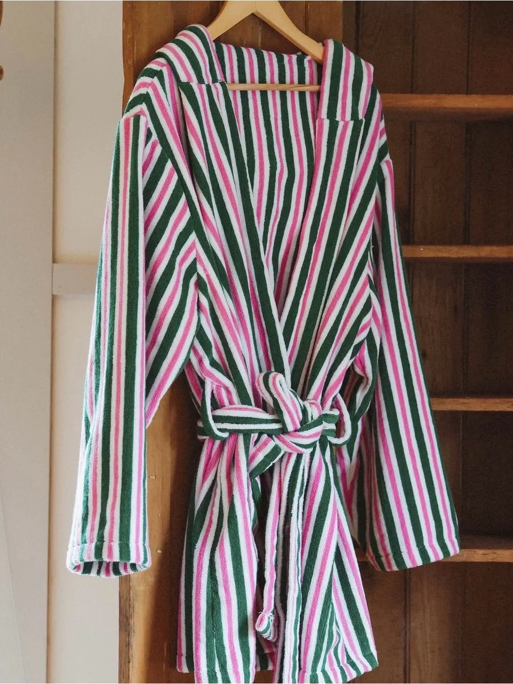 SBE Beauty “The Robe” in pink, white, and green